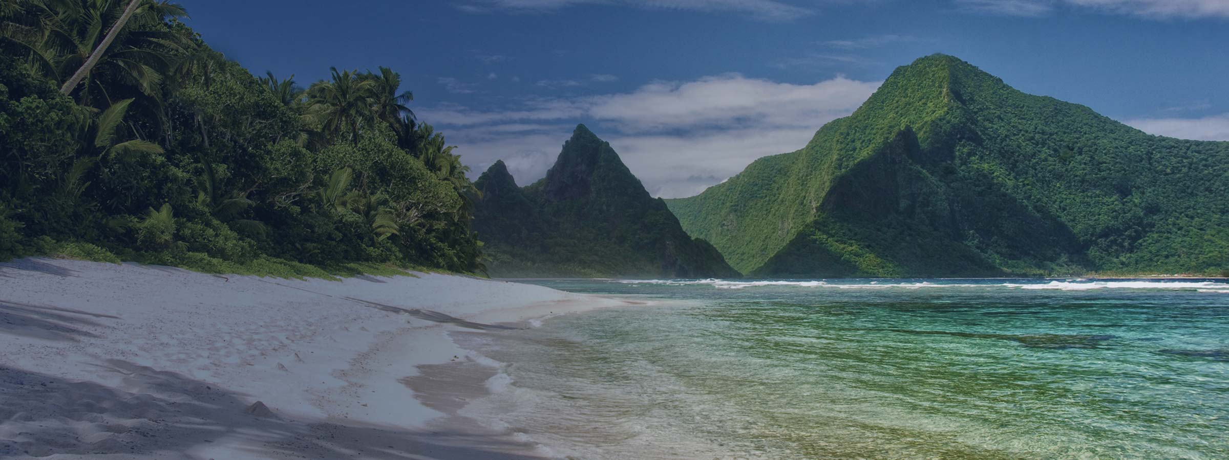 Beach and mountain view of the National Park of American Samoa